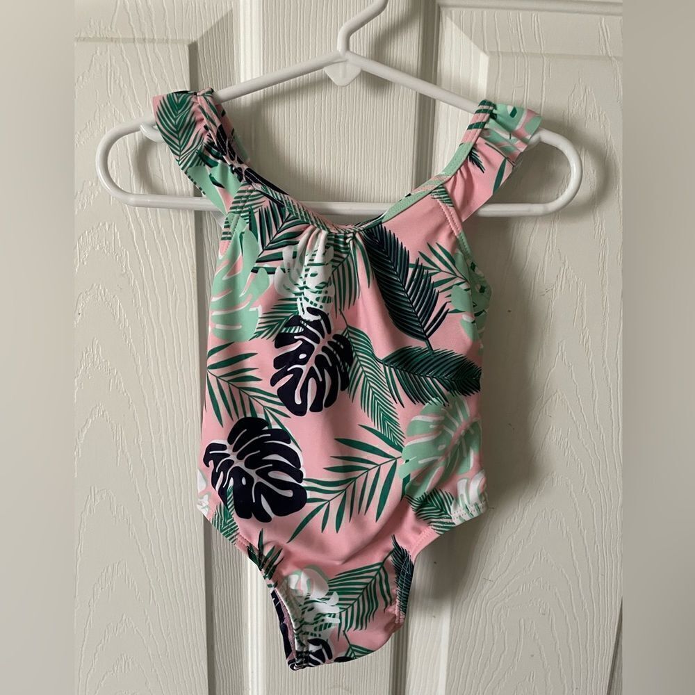 Shade critters pink tropical palm one piece swimsuit.